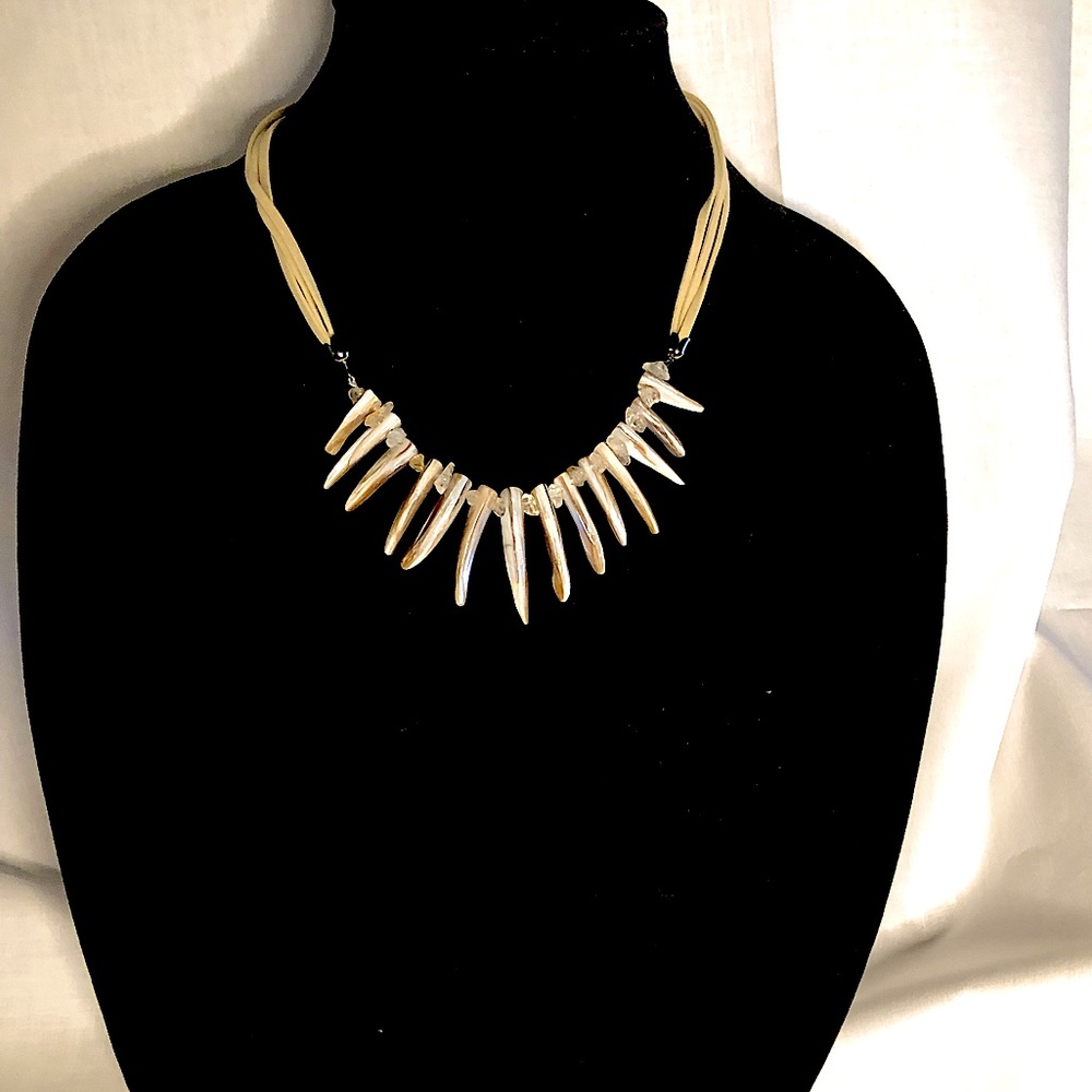 Elegant Gold and White Necklace